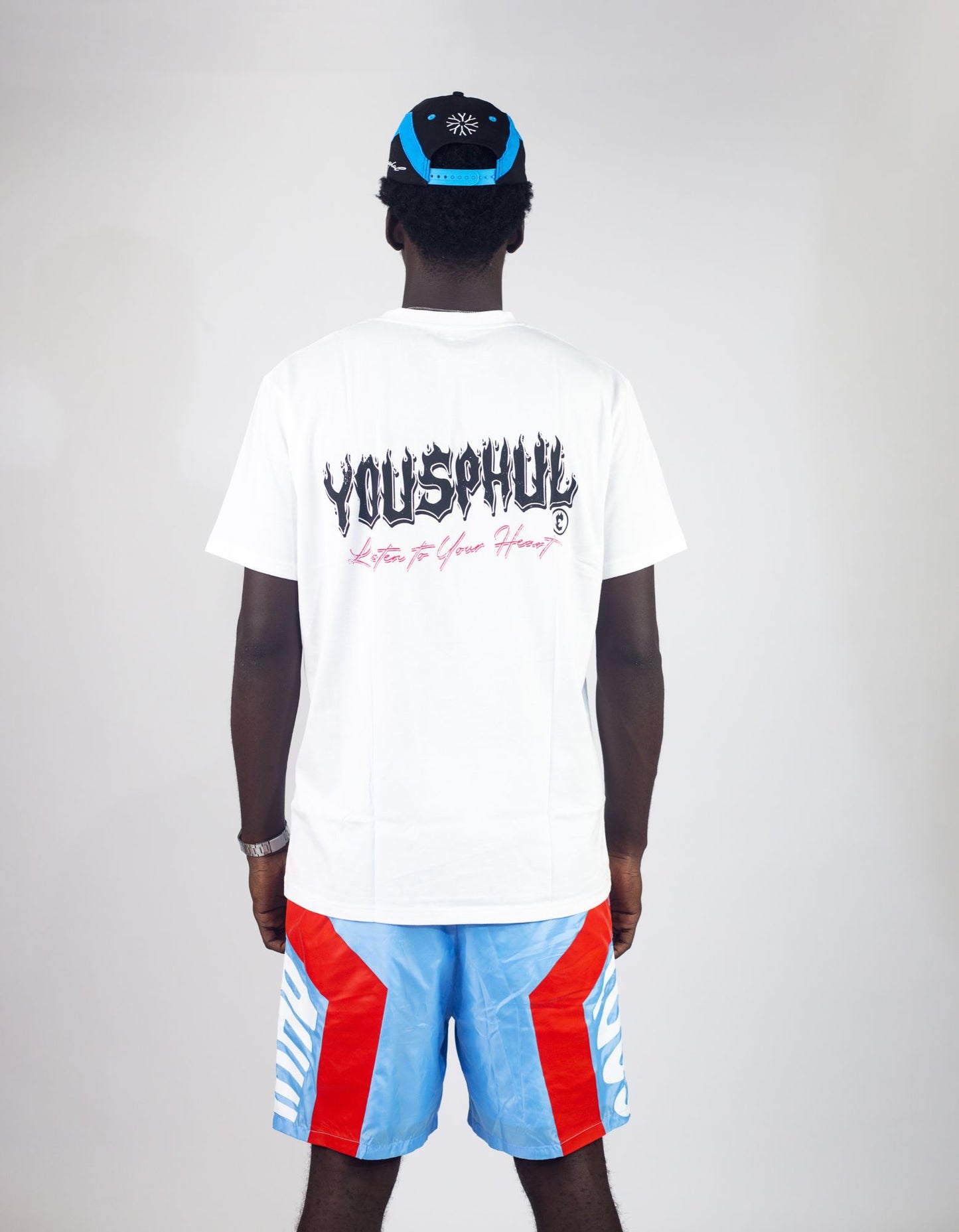 Model wearing Yousphul Listen to your Heart Tees in white color